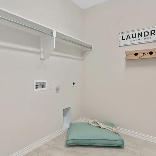 Plan 1534 Laundry Room Representative Photo by American Legend Homes