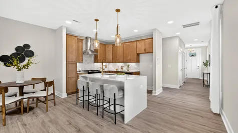 Kitchen, Dining, & Foyer (Model Home)