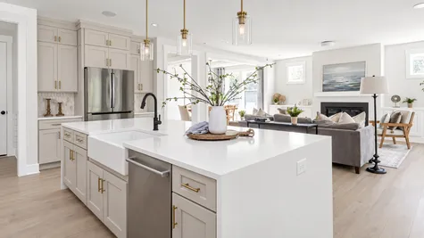 Waterfall Island with Farmhouse Sink