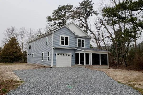 Custom 2 Story Beracah modified with a screened in front porch.  Located just outside Bethany Beach, Delaware