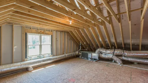 attic in a new custom home by boone homes