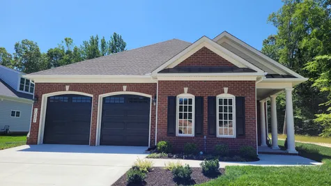 exterior of a 2 car garage home by boone homes