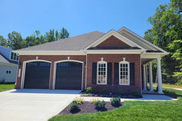 exterior of a 2 car garage home by boone homes