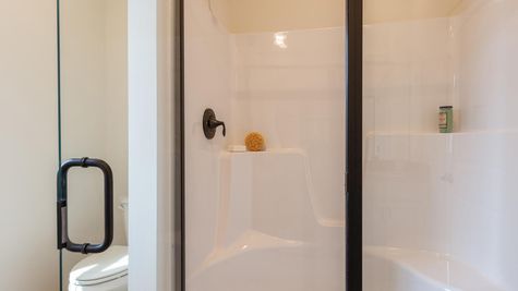 Primary Bathroom Suite, Monarch Model at Honeycroft Village 55+