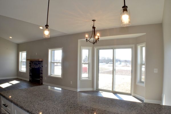 Dining area with sliding patio door to deck