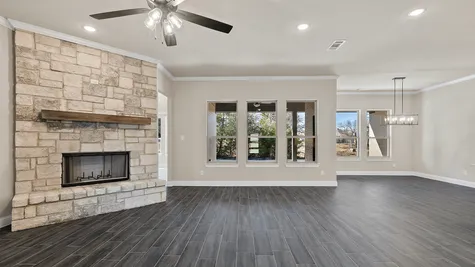 Open floor plan looking out on covered patio of 919 Silverleaf
