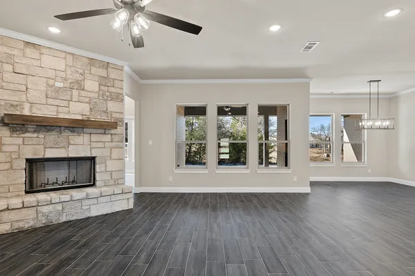 Open floor plan looking out on covered patio of 919 Silverleaf