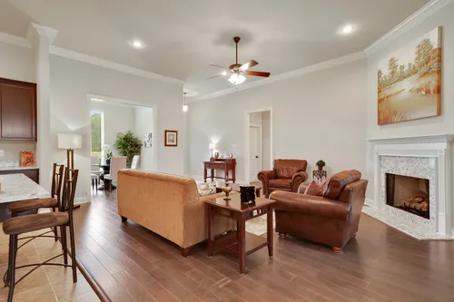 Woodland Manor - Model Home Living Room - DSLD Homes - Reims IV C - Gonzales, LA