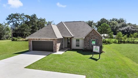 Painted door- Painted Shutters- Brick- Stucco- Cypress Beam- Front Elevation- Model Home- Silver Hill- Community- Ponchatoula Louisiana- Hammond area- DSLD Homes