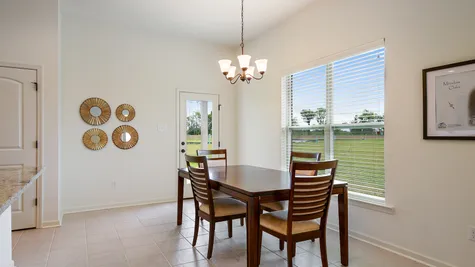 Dining Area- natural light- open floorplan- tile floor- Model Home - DSLD Homes- Baton Rouge area - St. Gabriel- Louisiana- Meadow Oaks