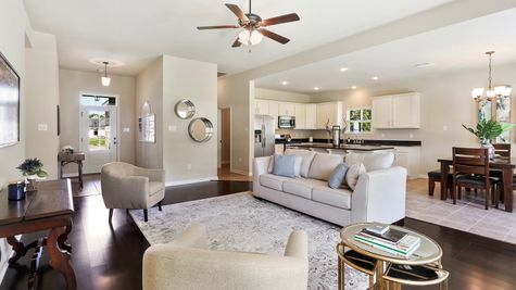 Natural Light- White Cabinets - Dark Granite- Living Room- Kitchen- foyer- Open Floor Plan- Model Home- Silver Hill- Community- Ponchatoula Louisiana- Hammond area- DSLD Homes