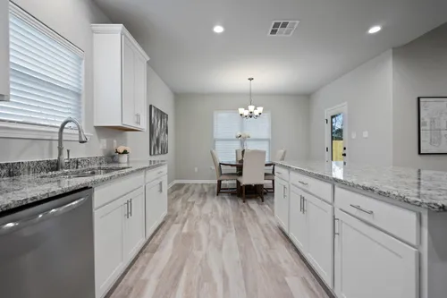 Simpson Farms Model Home Kitchen- Cary IV H Floor Plan - DSLD Homes - Covington, LA