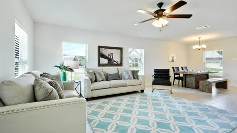 Living Room with Decor - Belvedere Place - DSLD Homes Gulfport