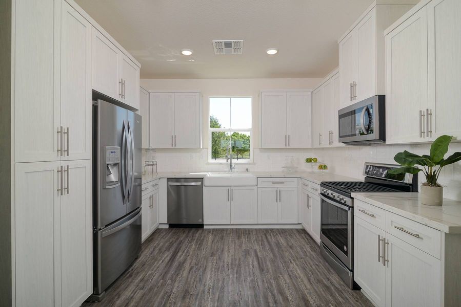 white kitchen in a new home for sale in ranch cordova ca
