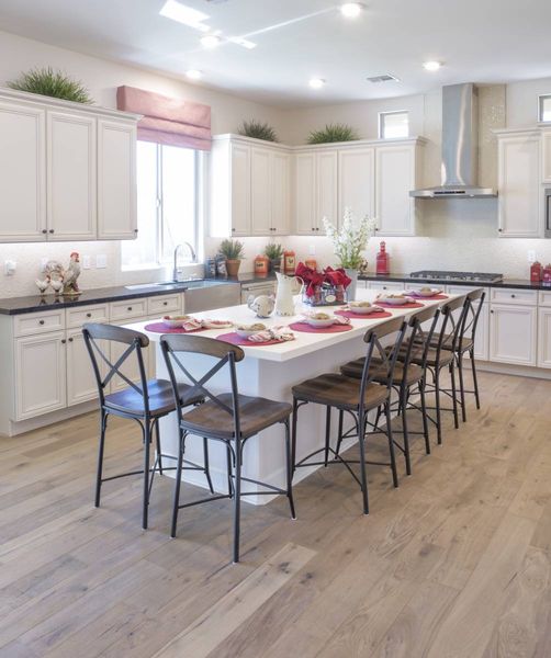 kitchen with eat in island in a new home in foothills yuma az