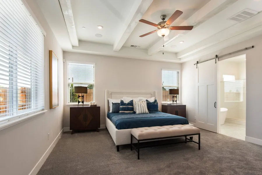 bright bedroom in a new home in yuma by elliott homes
