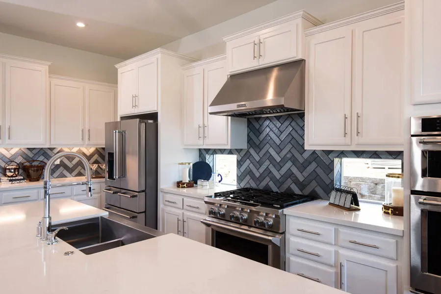 kitchen with white cabinets in a new housing development in yuma az