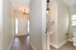 Foyer and powder room to right - *customer selections*