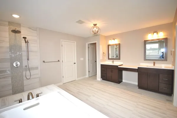 spacious bathroom in a new home in orhcard park ny