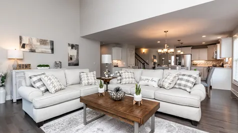 living room in a new construction home at the villas essex woods community