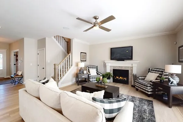 spacious living room in a new construction home by essex homes of wny