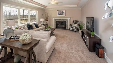 living room in a new patio home in orchard park by essex homes of WNY