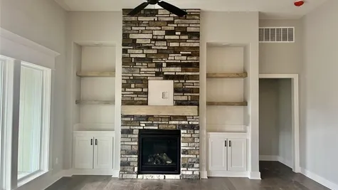 Beautiful fireplace with built-ins
