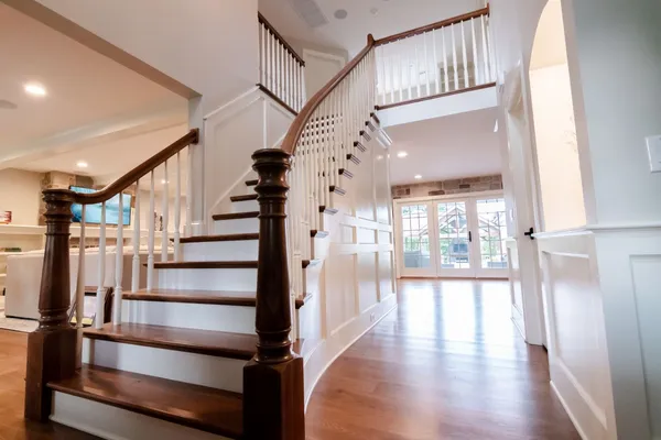 Staircase in the front of a house in a Garman Homes Remodel