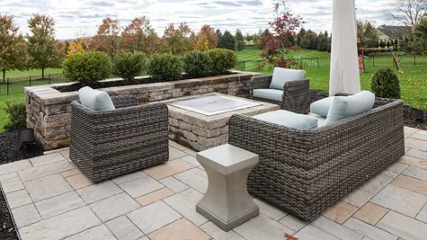 Patio with stone fire pit from garman builders