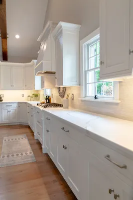 Kitchen with white cabinets in a Garman Homes Remodel