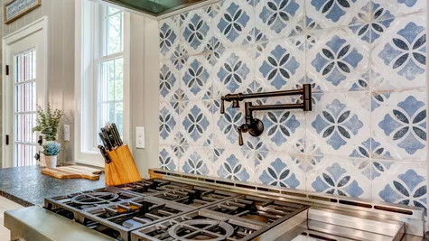 Stove top in a remodeled home from Garman builders