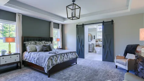 Bedroom with tray ceiling in the Abigail Model from Garman Builders