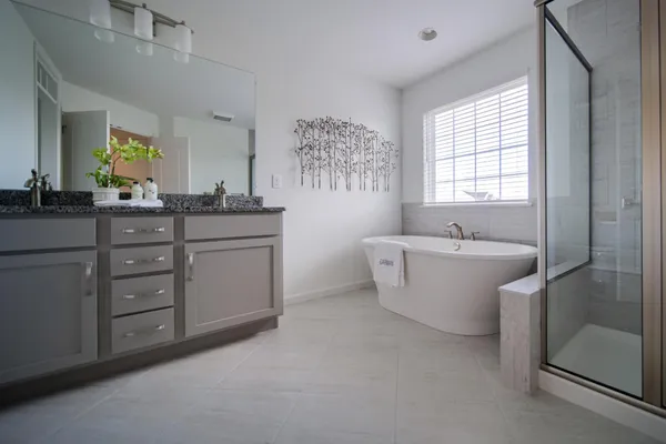 Bathroom with separate tub and shower in a Garman Builders new home