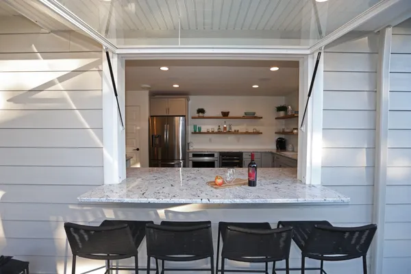 Remodeled back yard with a bar from Garman Builders