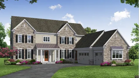Front elevation of a Stone home from Garman Builders