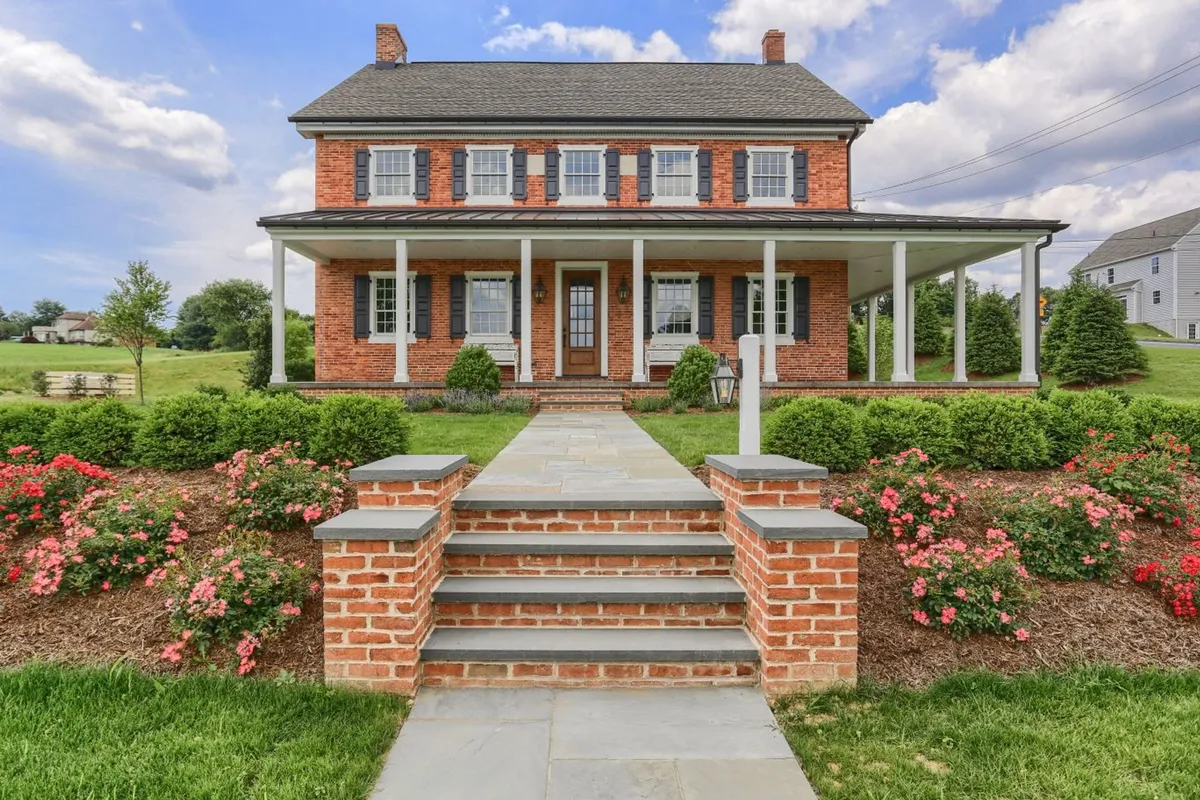 Front of a brick house from Garman Builders