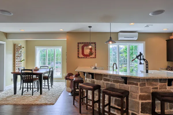 Kitchen and dining room in a Garman builders renovated home