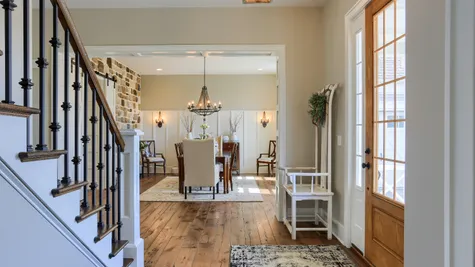 Dining room and front hallway in the Abigail Model from Garman Builders