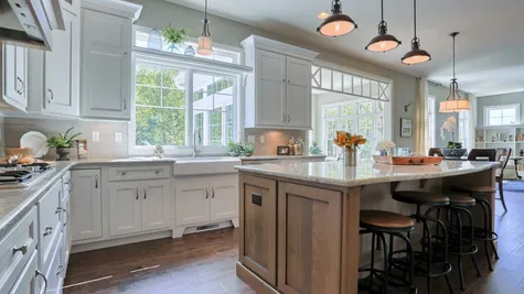 Kitchen with white cabinets in the Abigail Model from Garman Builders