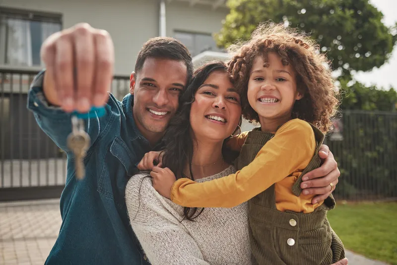 A family celebrating buying a new home