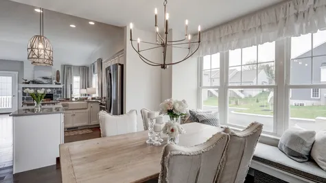 Dining room with chandelier in the Archer model from Garman Builders