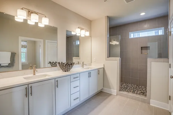 Owner's Bath with Walk-In Shower and dual vanities