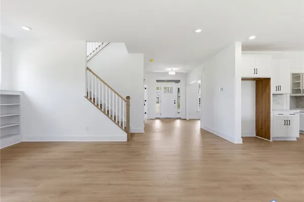 Great Room from Entry -Photos are representative examples of a completed home; actual selections will vary