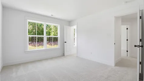 2nd floor bedroom - Photo represents the actual home