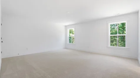 Primary Bedroom - Photo represents the actual home