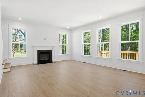 Great room - Photo represents actual home
