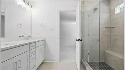 Primary Bathroom- Photo represents actual home