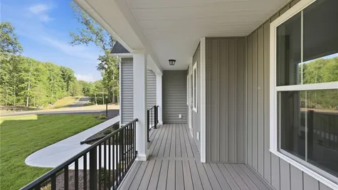porch Photos are representative of the home plan and may not reflect the features or finishes of this specific home.