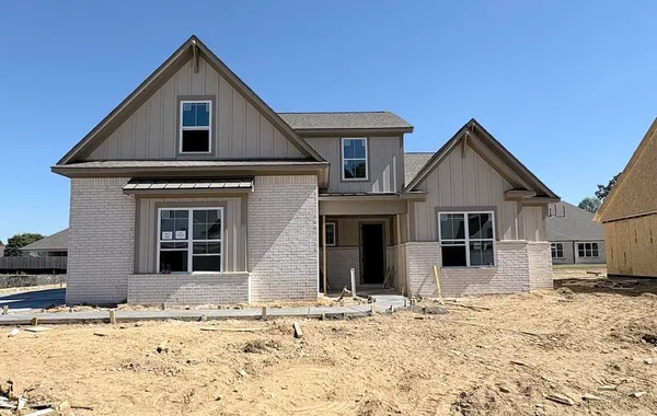 Gray brick and board and batten siding exterior