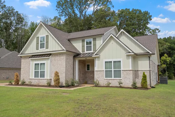 Brick and siding exterior with multiple gables
